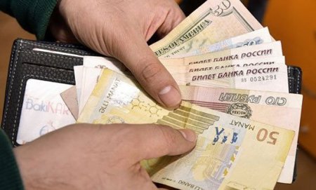 Dollar mühüm valyutalar qarşısında ucuzlaşır