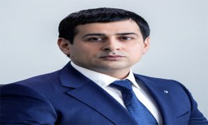 Rusiyadan Bakıya tez-tez çamadanlarla pul daşıyan Emin Axundov kimdir?