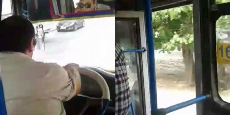 Bakıda avtobus sürücüsündən özbaşınalıq: qulağında telefon avtobusu qapısı açıq sürür.