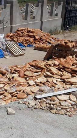 Bakıda yüzlərlə çörək zibilliyə atıldı (FOTOLAR)