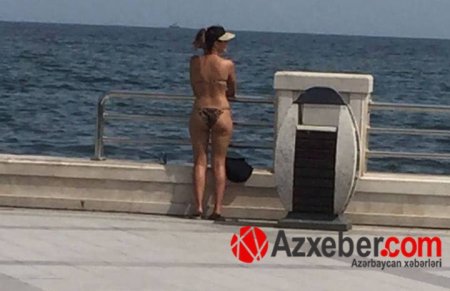 Bakı bulvarında yarıçılpaq turist hər kəsi təəccübləndirdi: Öncə günəşləndi, sonra çimdi (FOTO)