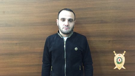 Bakıda marketin damını sökərək obyektdən seyf oğurlayan şəxslər saxlanılıb - FOTO 