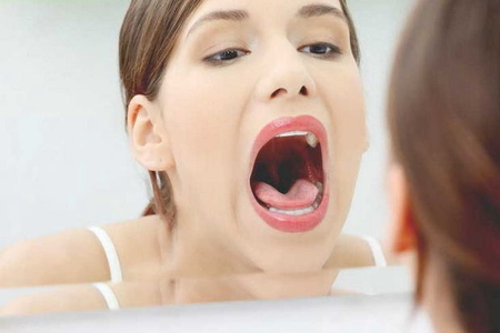 Koronavirusun daha bir simptomu açıqlanıb