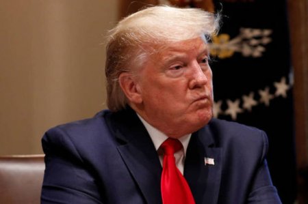 Tramp içiboş qovluğa görə məhkəməyə çağırıldı